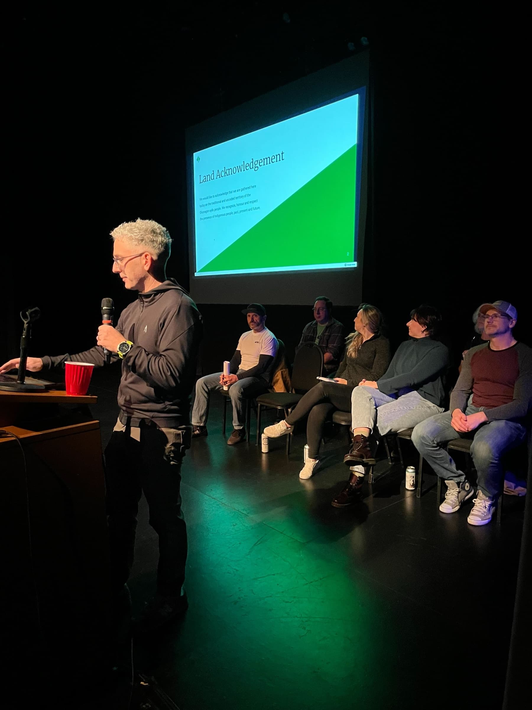 David Gluzman on stage during a panel discussion
